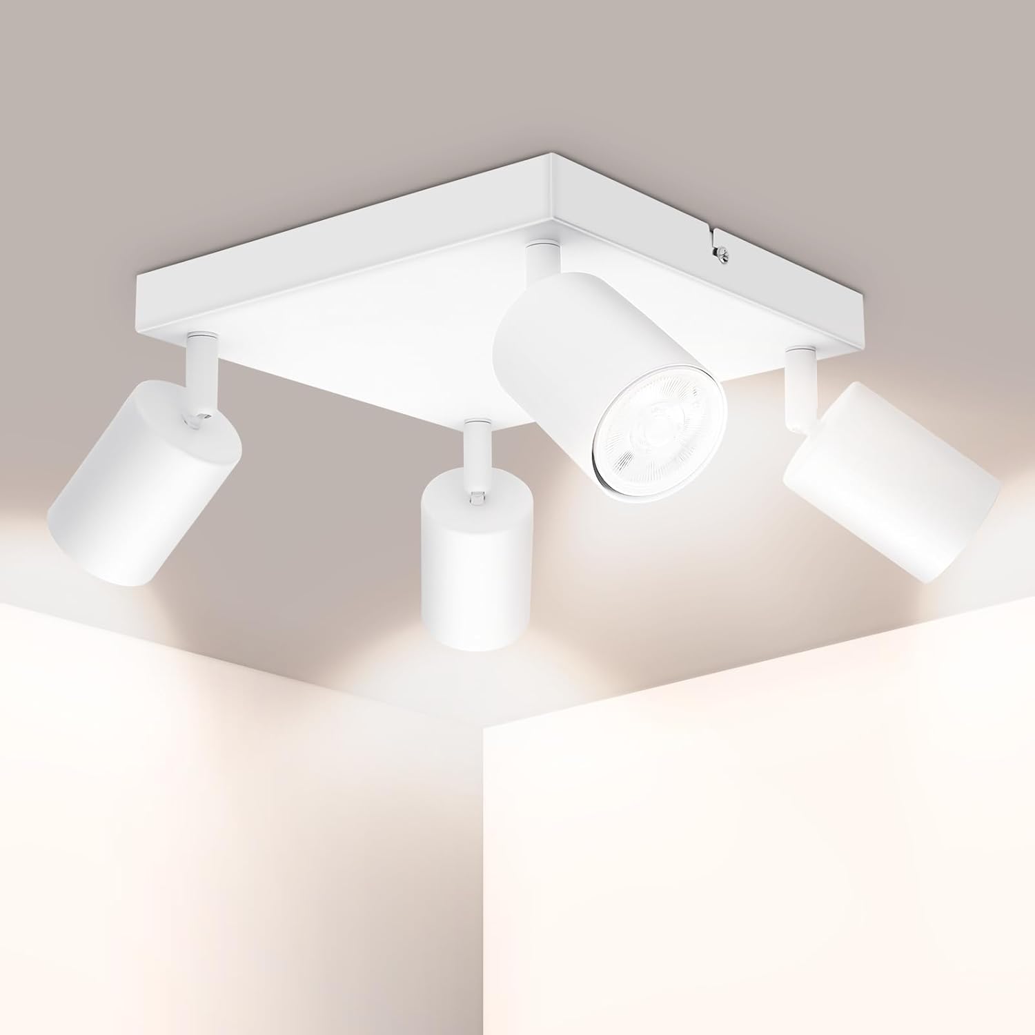 Modern ceiling light fixture with four lights on a neutral background