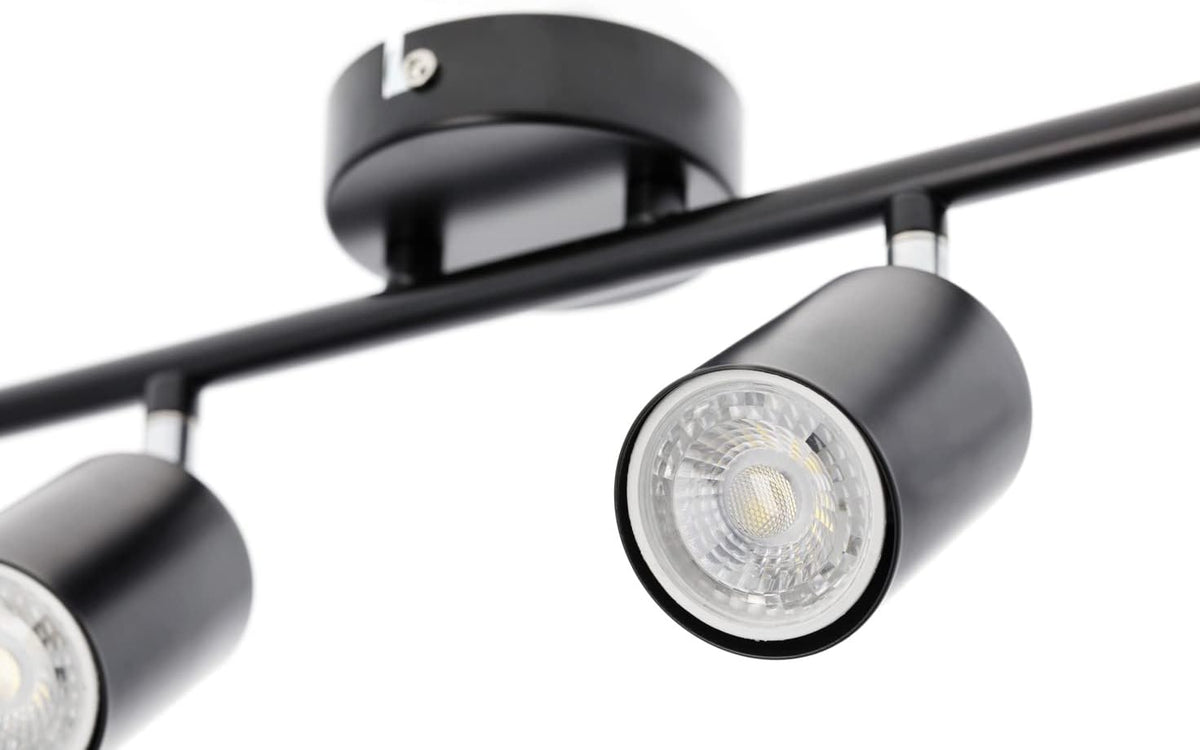 Black track lighting fixture on a white background