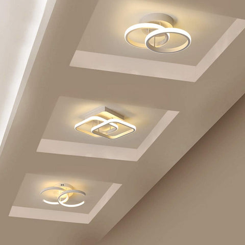 Modern ceiling lights on a ceiling with geometric patterns