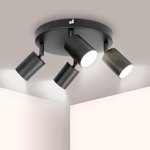Modern ceiling light fixture with four lights on a neutral background