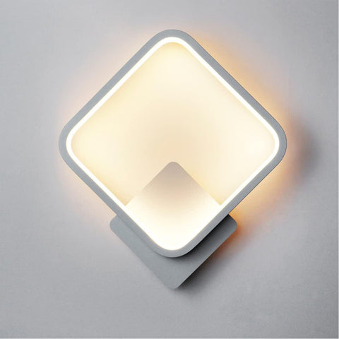 Dimmable LED wall light displaying three brightness levels for versatile lighting