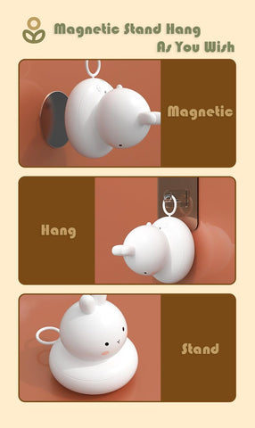 White magnetic stand with cartoon design on a beige background