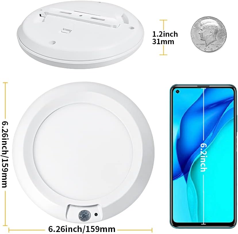 Round white device with dimensions shown next to a smartphone