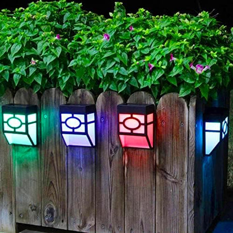 Modern LED solar-powered wall light mounted on an outdoor wall at night

