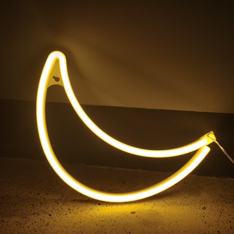Neon light shaped like a banana on a dark background