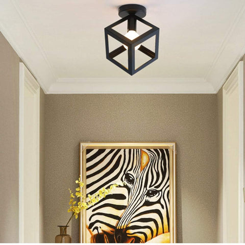 Close-up of the industrial metal frame with geometric cube design

