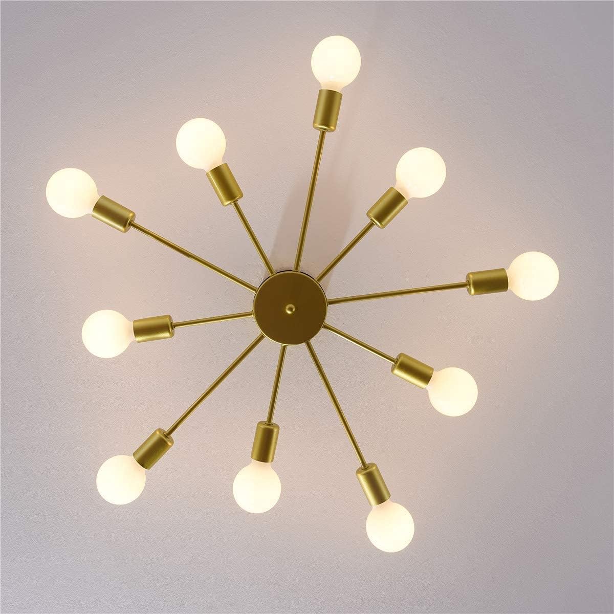 Gold ceiling light fixture with multiple bulbs on a plain background