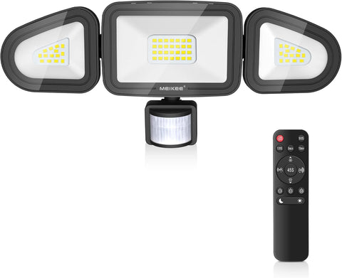 LED flood light with motion sensor and remote control on a white background