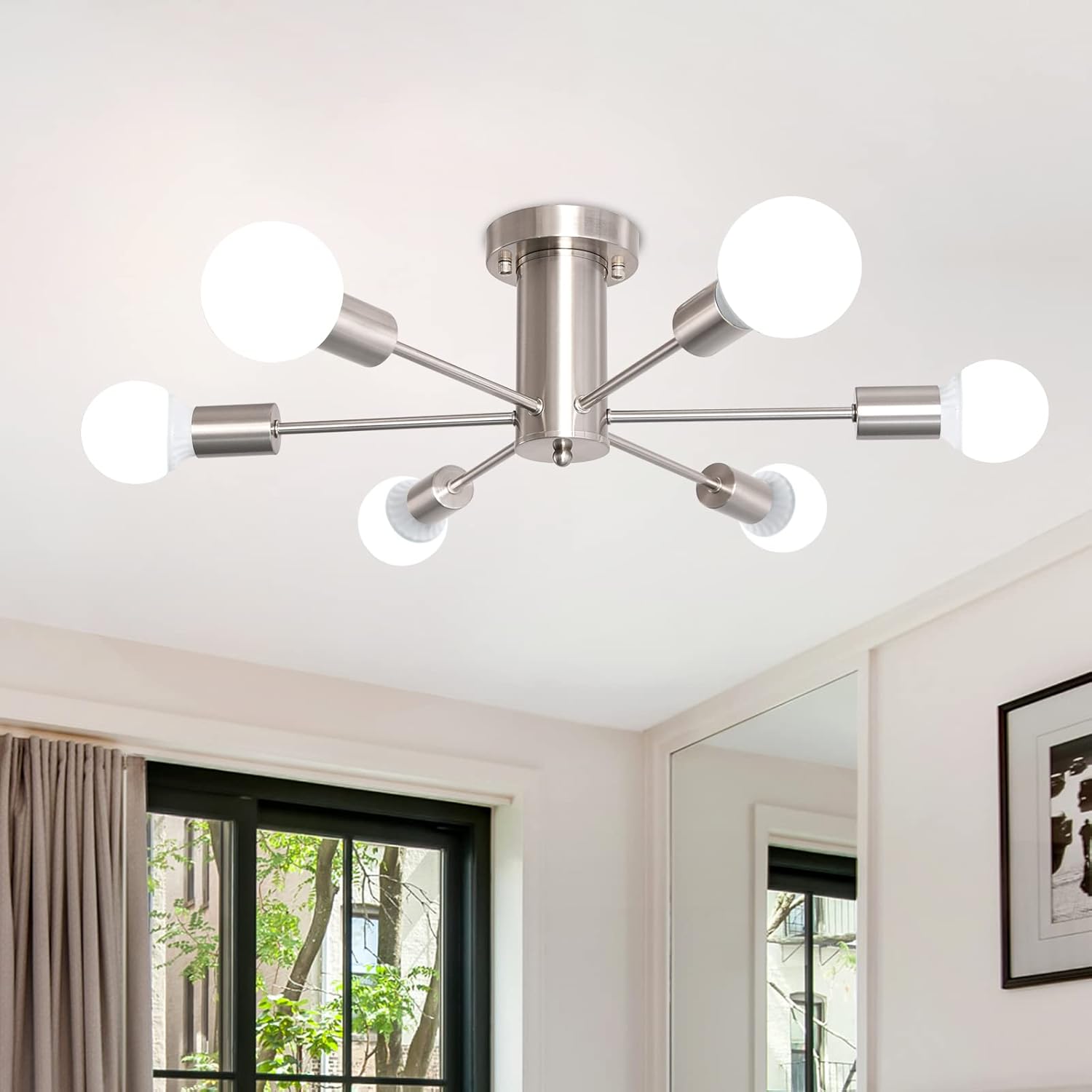 Modern ceiling light fixture in a room with a window and mirror.