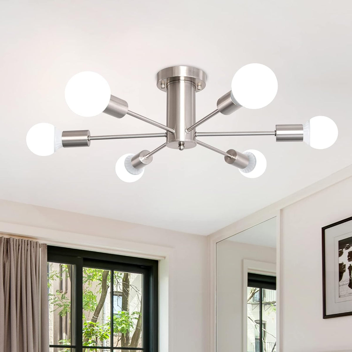 Modern ceiling light fixture in a room with a window and mirror.