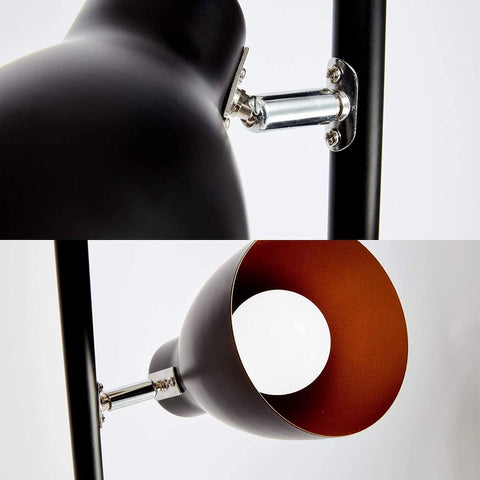 Close-up of a modern floor lamp with black and brown shades on a white background.