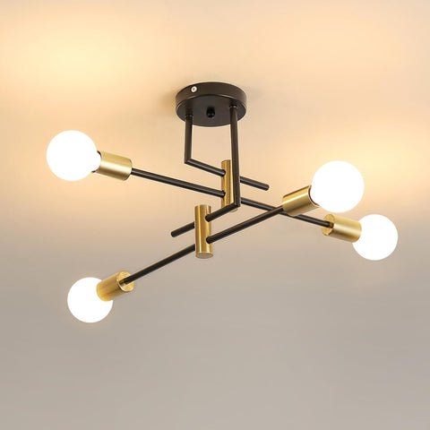 Modern ceiling light fixture with black and gold design on a neutral background