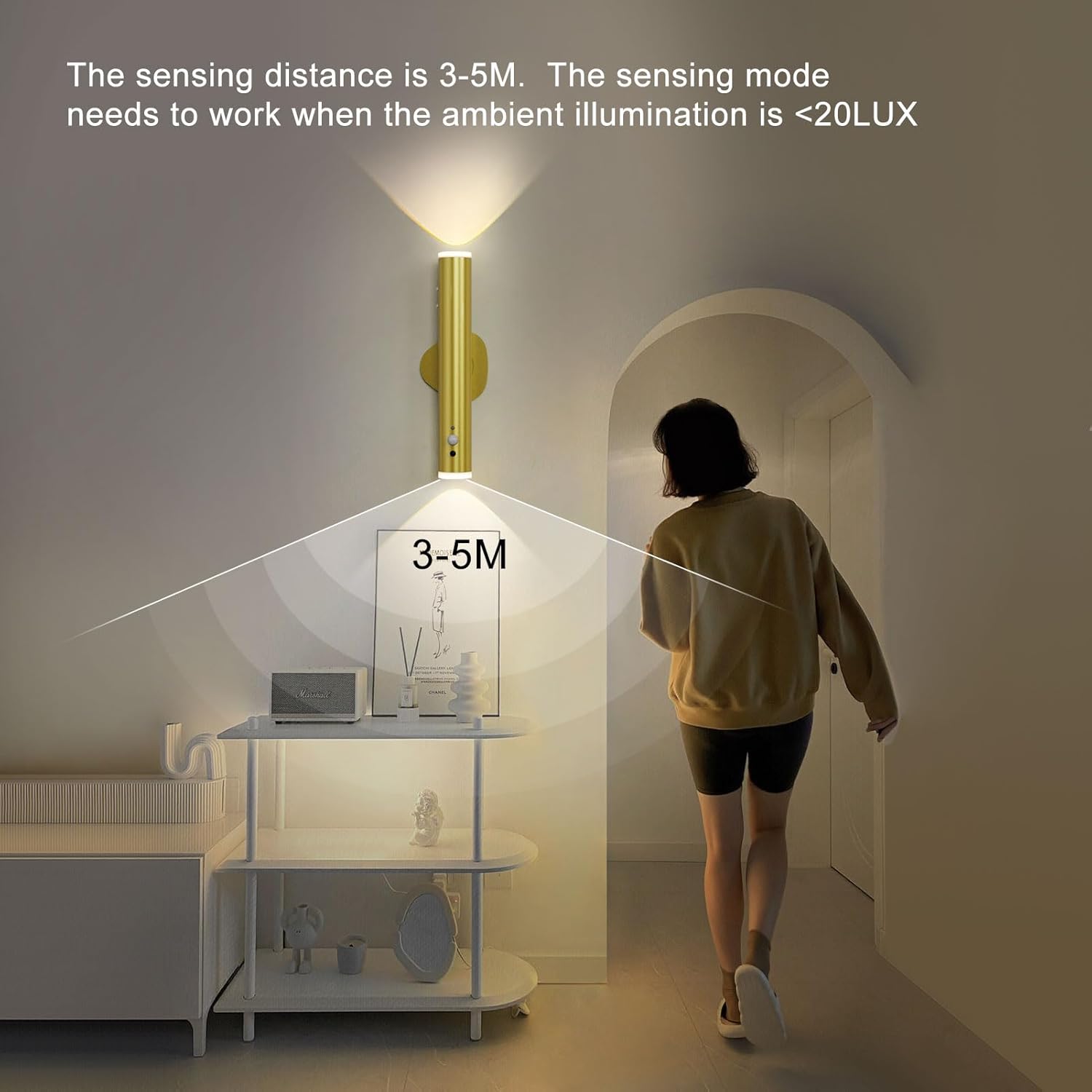 Person walking towards a light fixture with text about sensing distance and illumination requirements.