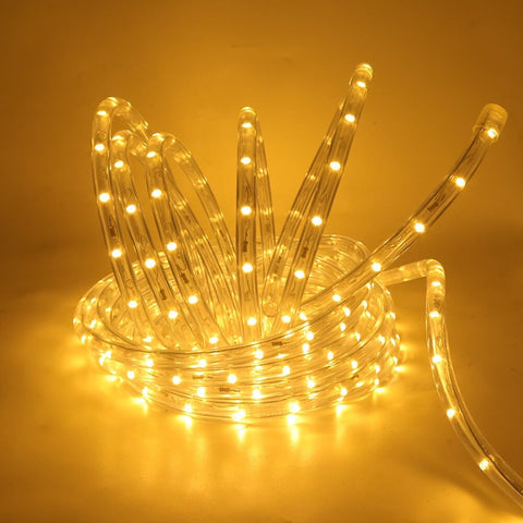 Coiled LED light strip on a yellow background