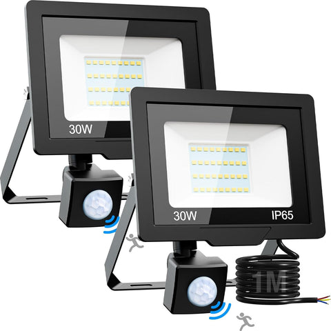 Two LED flood lights with motion sensors on a white background
