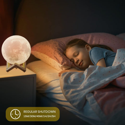 Moon lamp emitting a soft glow in a dark room.


