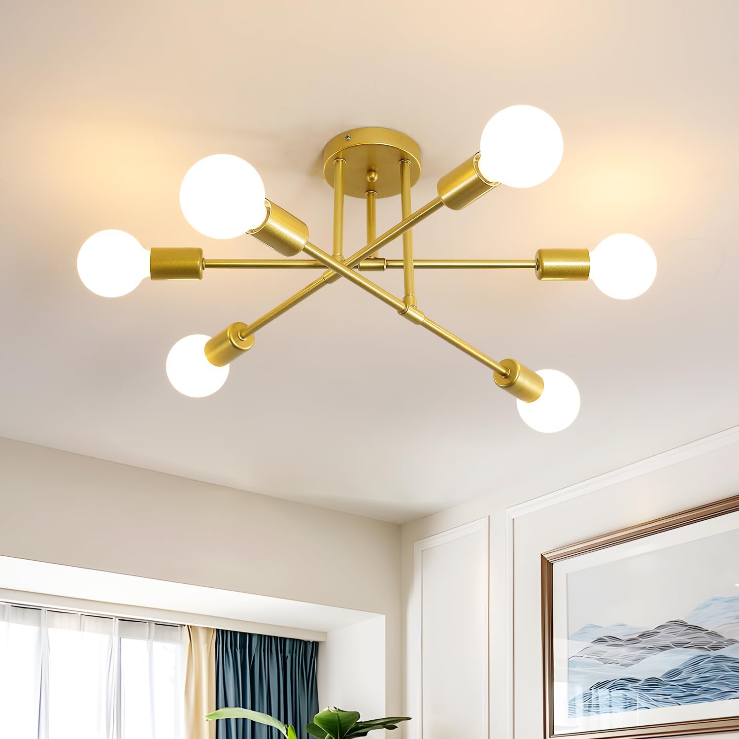 Gold ceiling light fixture with multiple bulbs in a room setting.