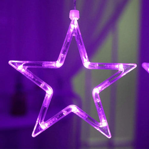 Purple LED star-shaped light against a dark background