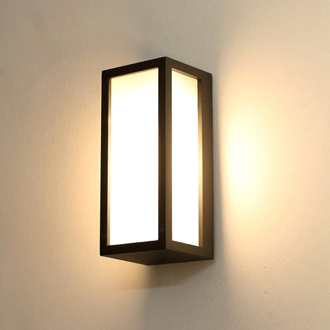 Water-resistant aluminum wall light with raindrops, showcasing its durability in wet conditions