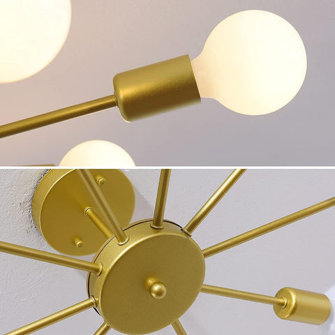 Gold ceiling light fixture with multiple arms and illuminated bulbs on a neutral background.