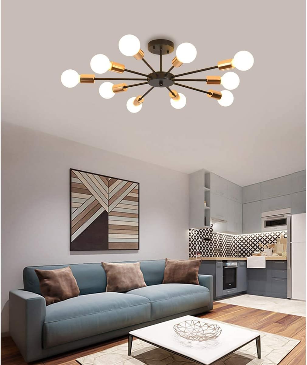 Modern living room with a chandelier, sofa, and coffee table.