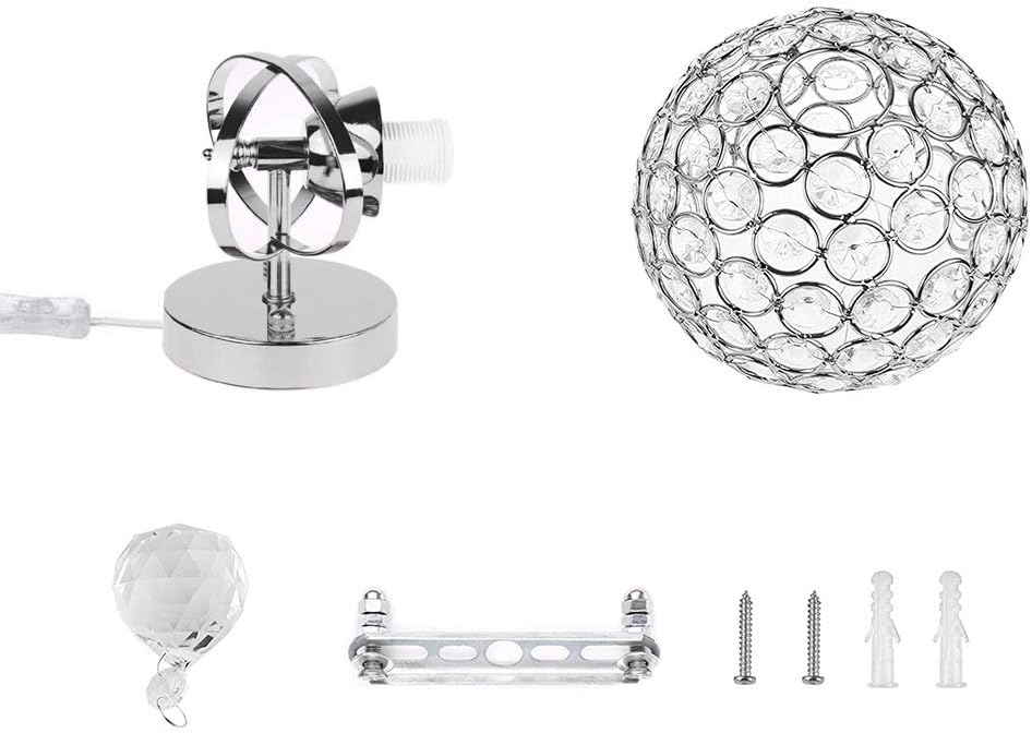 Set of decorative lamp parts including a crystal ball, metal bracket, and screws on a white background.