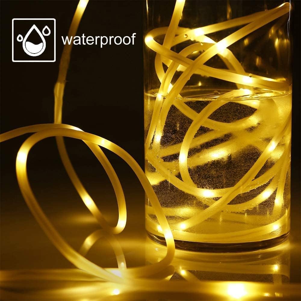 Gold LED strip light in a glass container with 'waterproof' label.