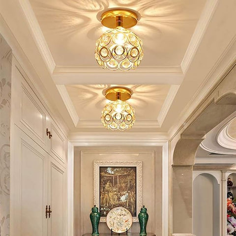 Stylish gold globe lighting fixture


