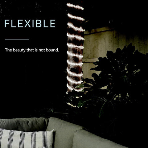 Decorative lamp with spiral design in a dark setting, text 'FLEXIBLE' and 'The beauty that is not bound.'