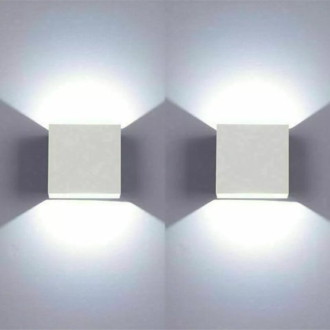 Close-up of the black exterior and gold interior of the wall light

