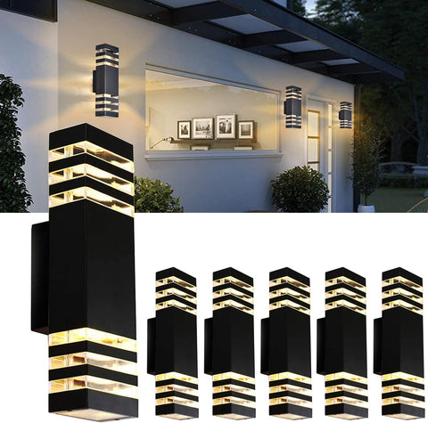 Modern outdoor wall lights on a house exterior with close-up details.