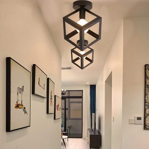 Close-up of the industrial metal frame with geometric cube design

