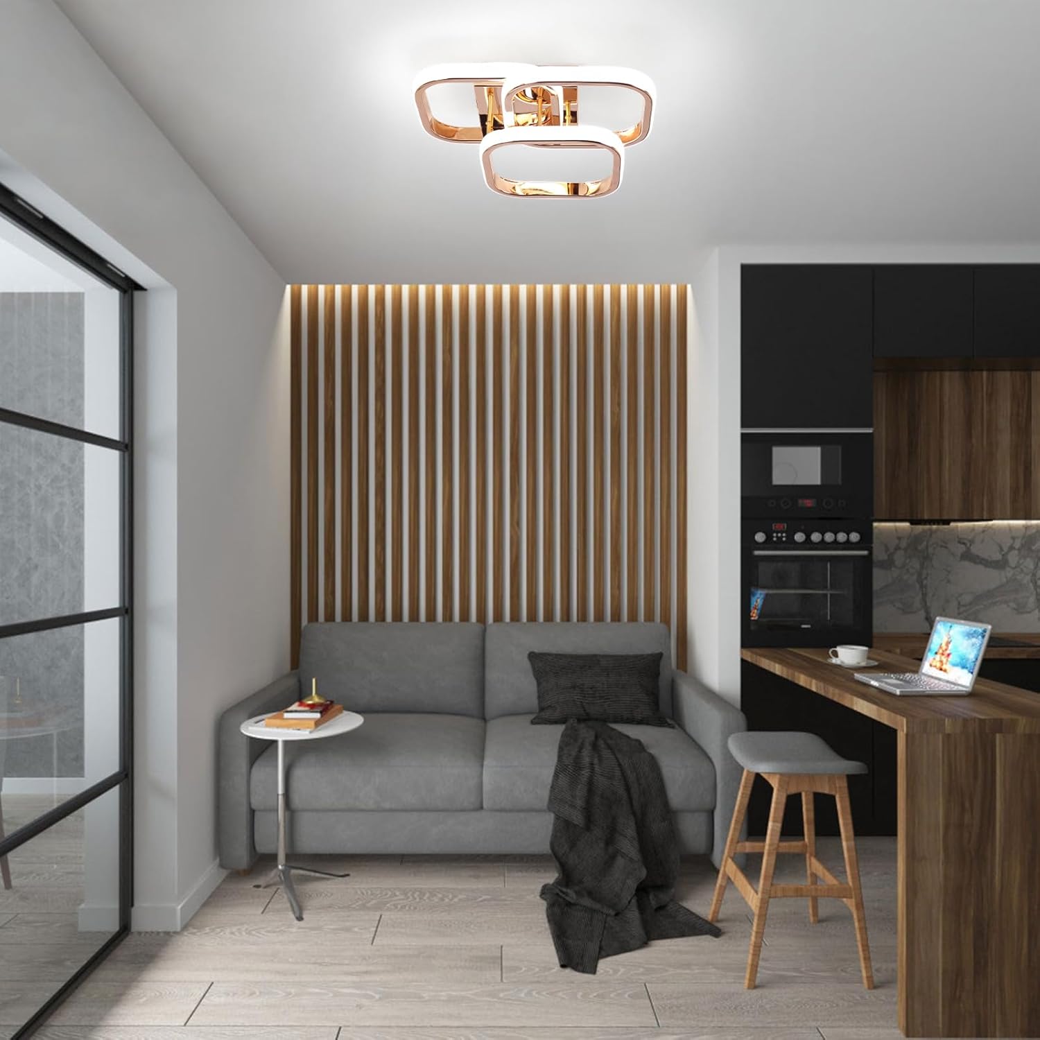 Modern living room with gray sofa, wooden bar, and decorative wall.