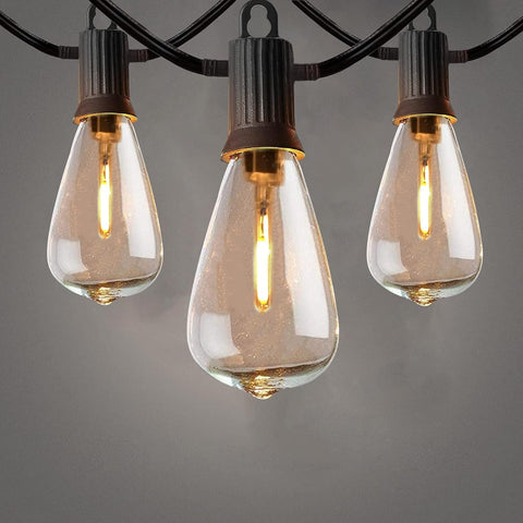 Vintage-style outdoor festoon lights strung across a patio

