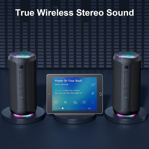 True wireless stereo sound system with two speakers and a central control panel on a dark background.