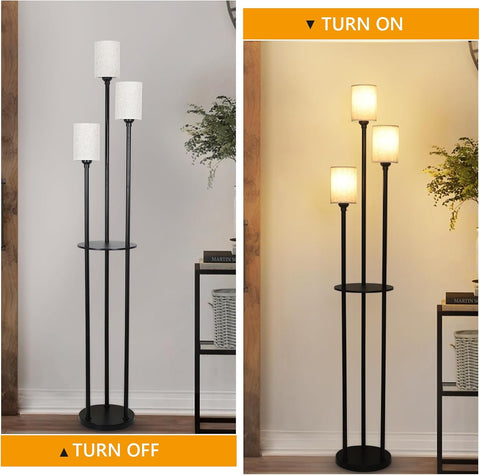 Floor lamp with two light bulbs, one on and one off, in a room setting.