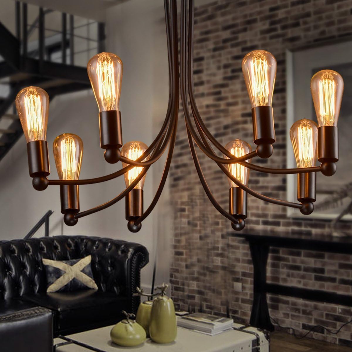 Chandelier with vintage-style light bulbs in a living room setting.