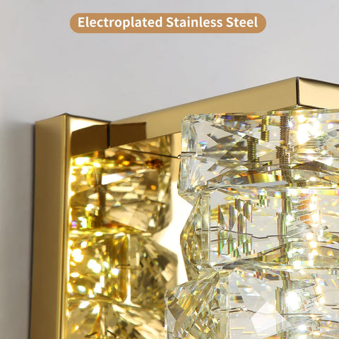 Gold and crystal wall light fixture with 'Electroplated Stainless Steel' text.