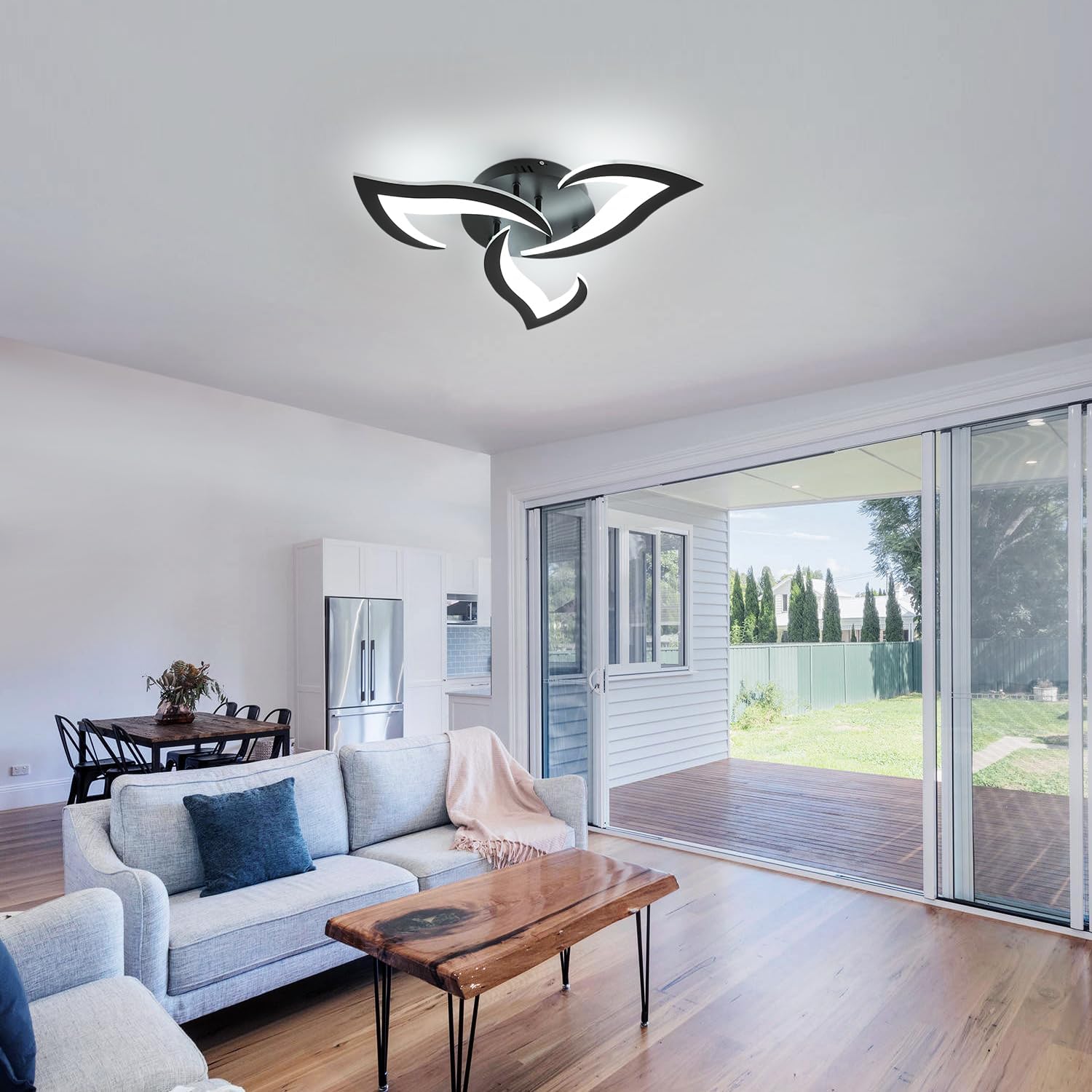 Modern living room with a stylish ceiling light fixture.