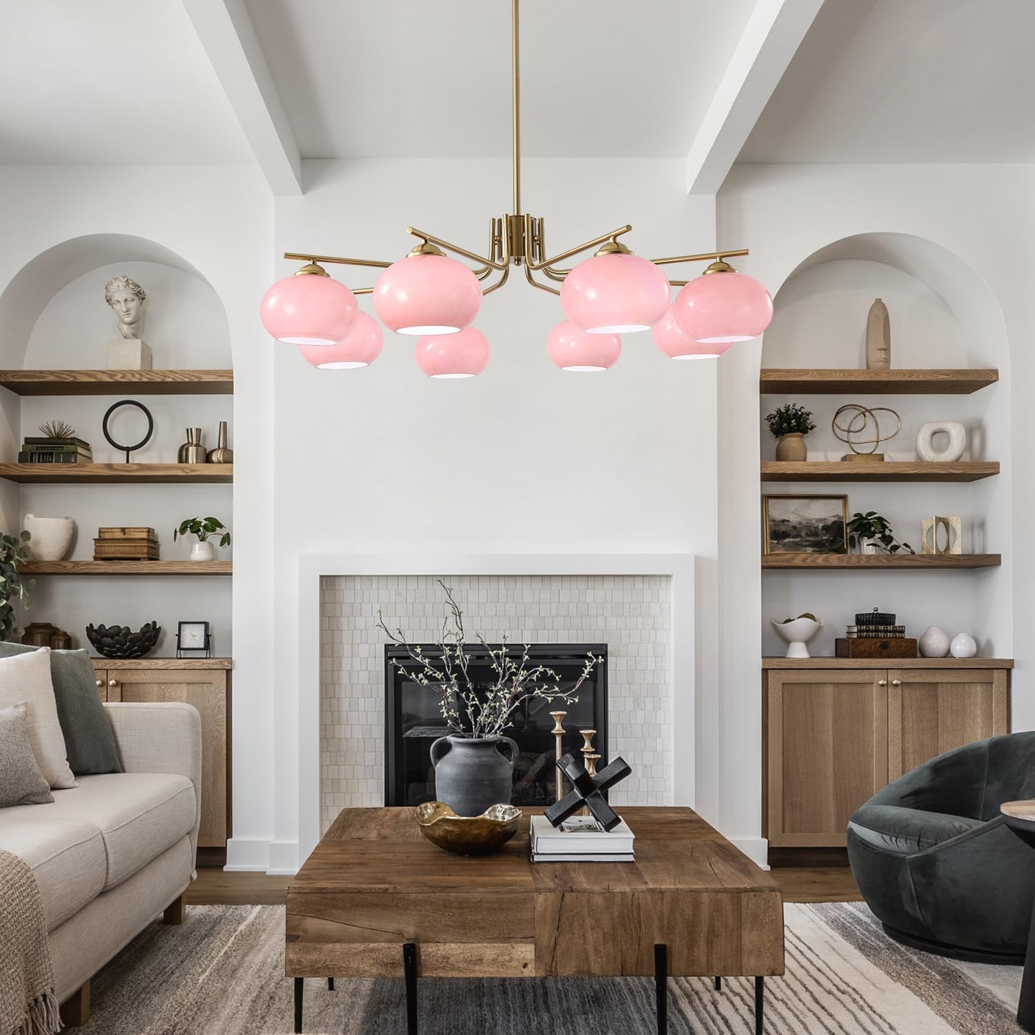 Modern living room with pink ceiling lights, wooden coffee table, and decorative shelves.