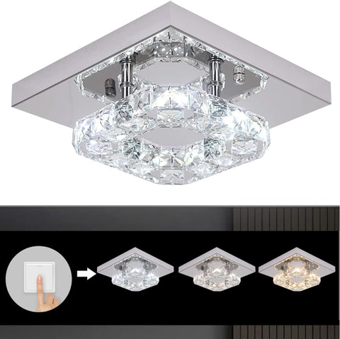 Ceiling light fixture with crystal design and color change options.
