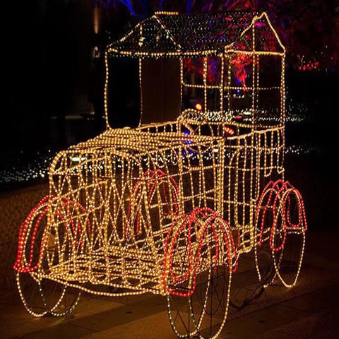 Decorative light display of a vintage car at night