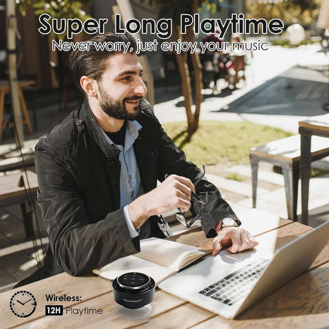 Man using a laptop outdoors with text about music playtime