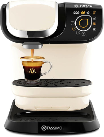 Bosch Tassimo coffee machine dispensing a cup of coffee.