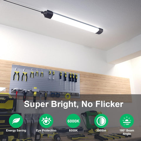 Ceiling light fixture in a workshop with tools on a wall panel, highlighting features like 'Super Bright, No Flicker'.