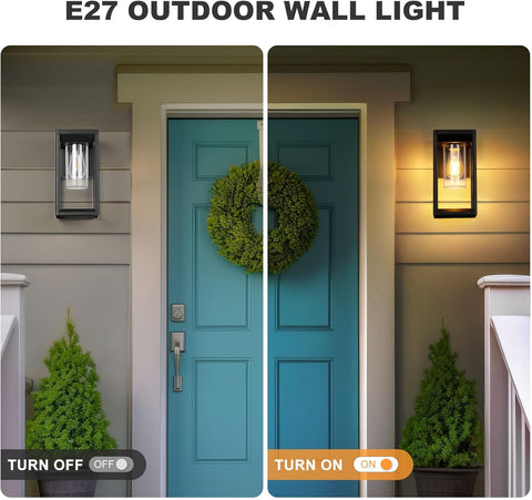 Outdoor wall lights on a house exterior with a blue door and wreath.