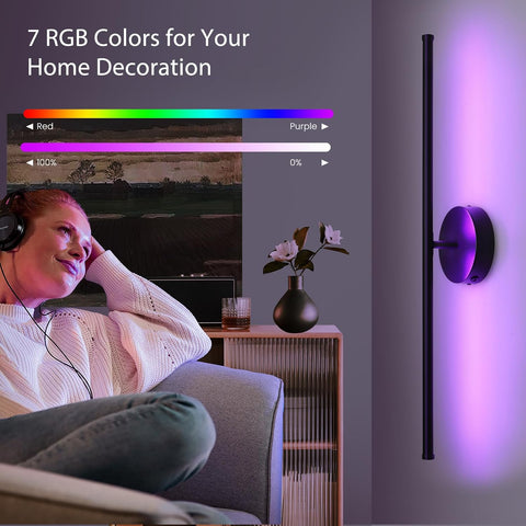 Woman watching TV with a wall-mounted LED light displaying RGB colors on a gray wall.