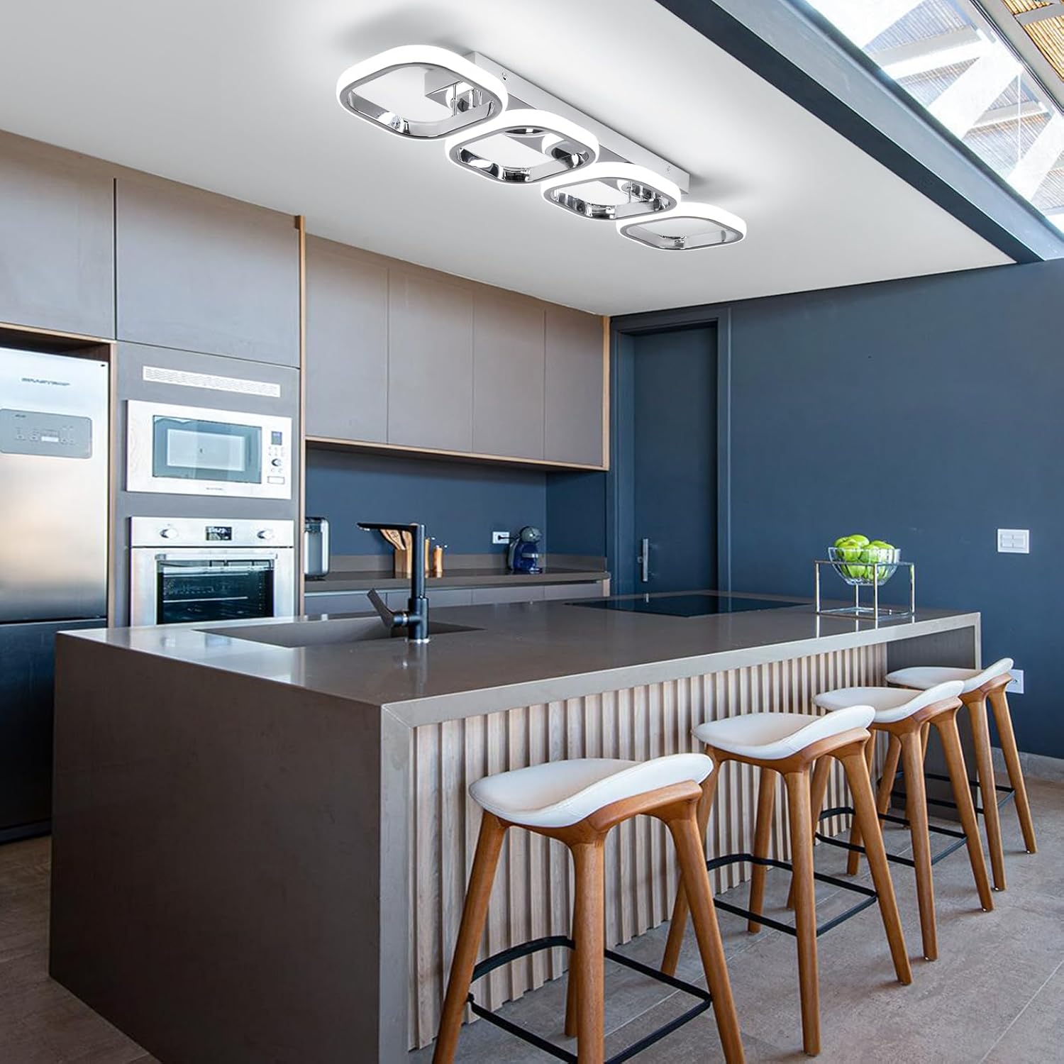 Modern kitchen with island, stools, and appliances