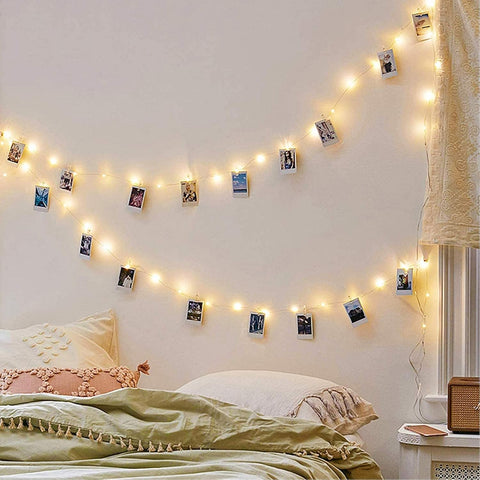 Close-Up of LED Lights with Photo Clips Illuminating Pictures