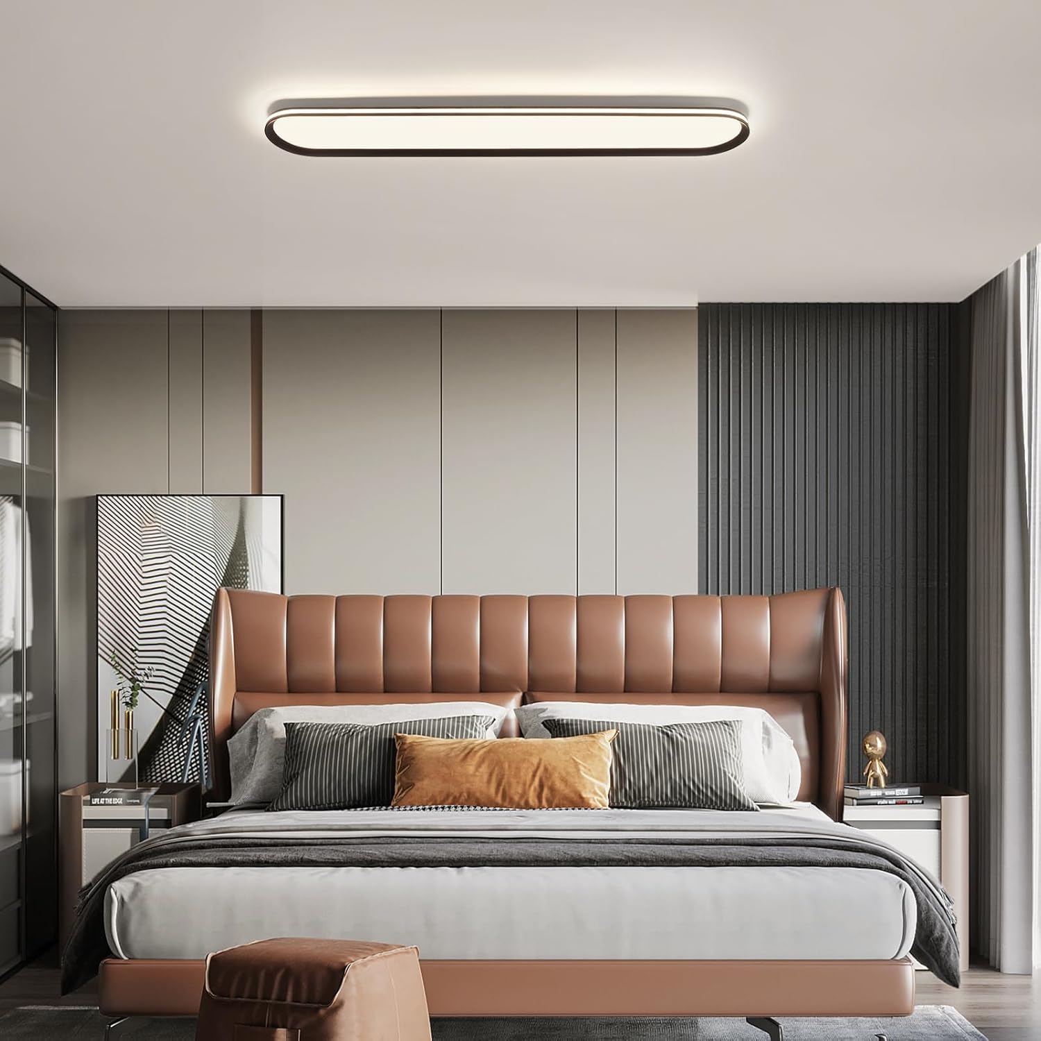 Modern bedroom with a brown leather headboard and gray bedding.